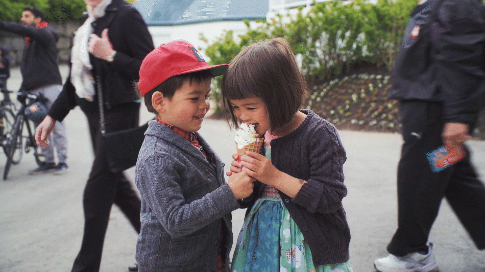 Photo of Siblings sharing ice cream